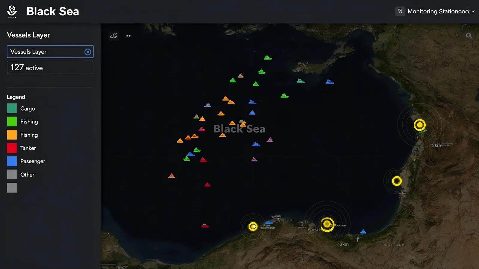 AIS Vessel Traffic Overlay on the Atlas, live ship positions across the Black Sea coloured by type (cargo, fishing, tanker, passenger, other), with 2 km proximity rings around monitoring stations that trigger Vessel Proximity Alerts.